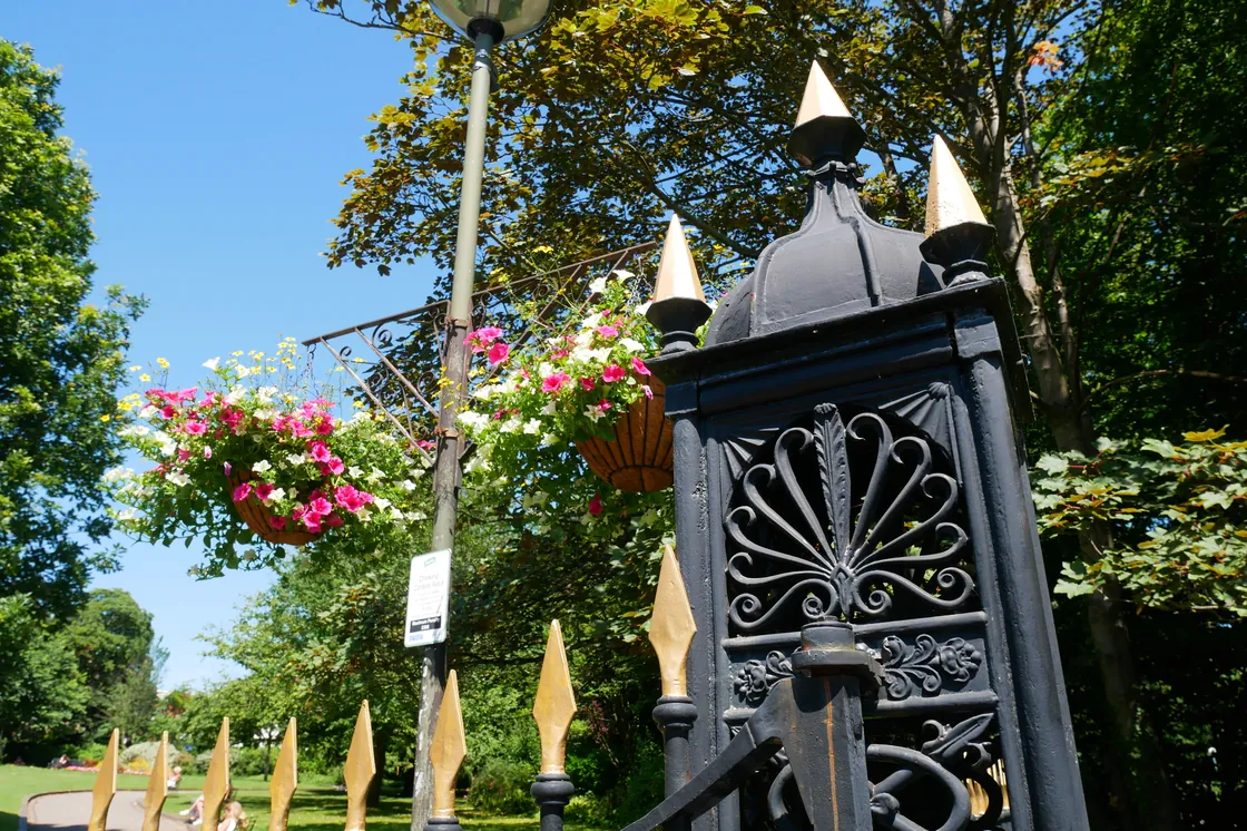 Queen's Garden gates with hanging flowers, Bromley
