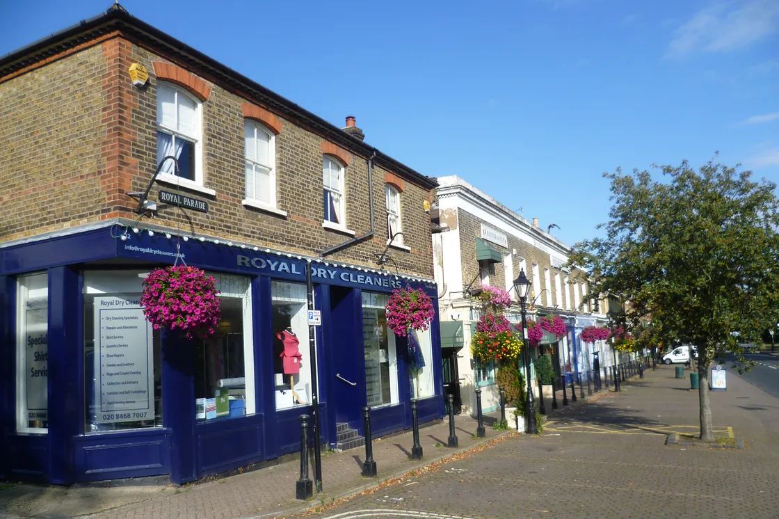 Shopfronts and hanging baskets on Royal Parade, Chislehurst
